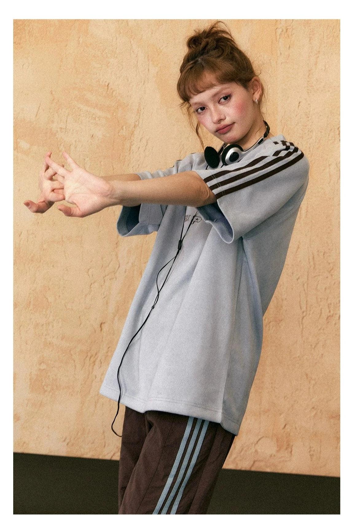 Ezek Free Project Sporty Two-piece Set - Graphic T-shirt and Wide-leg Track Pants