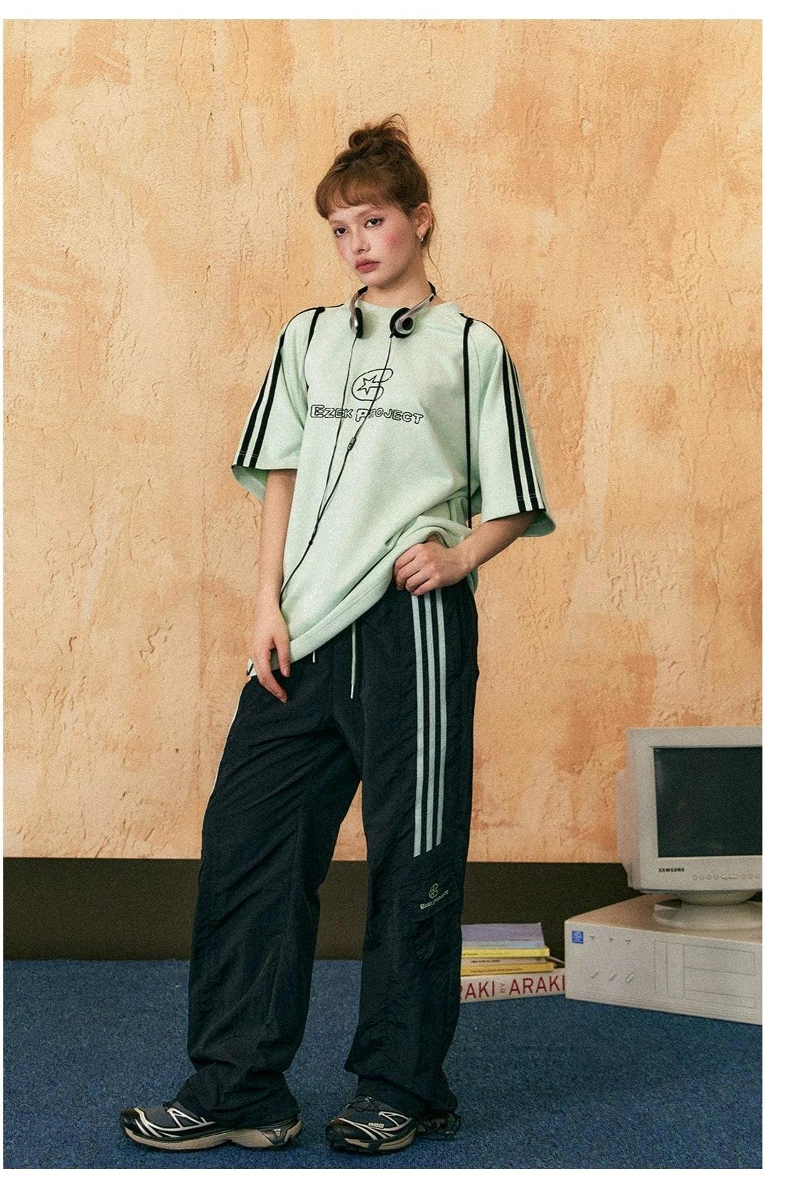 Ezek Free Project Sporty Two-piece Set - Graphic T-shirt and Wide-leg Track Pants