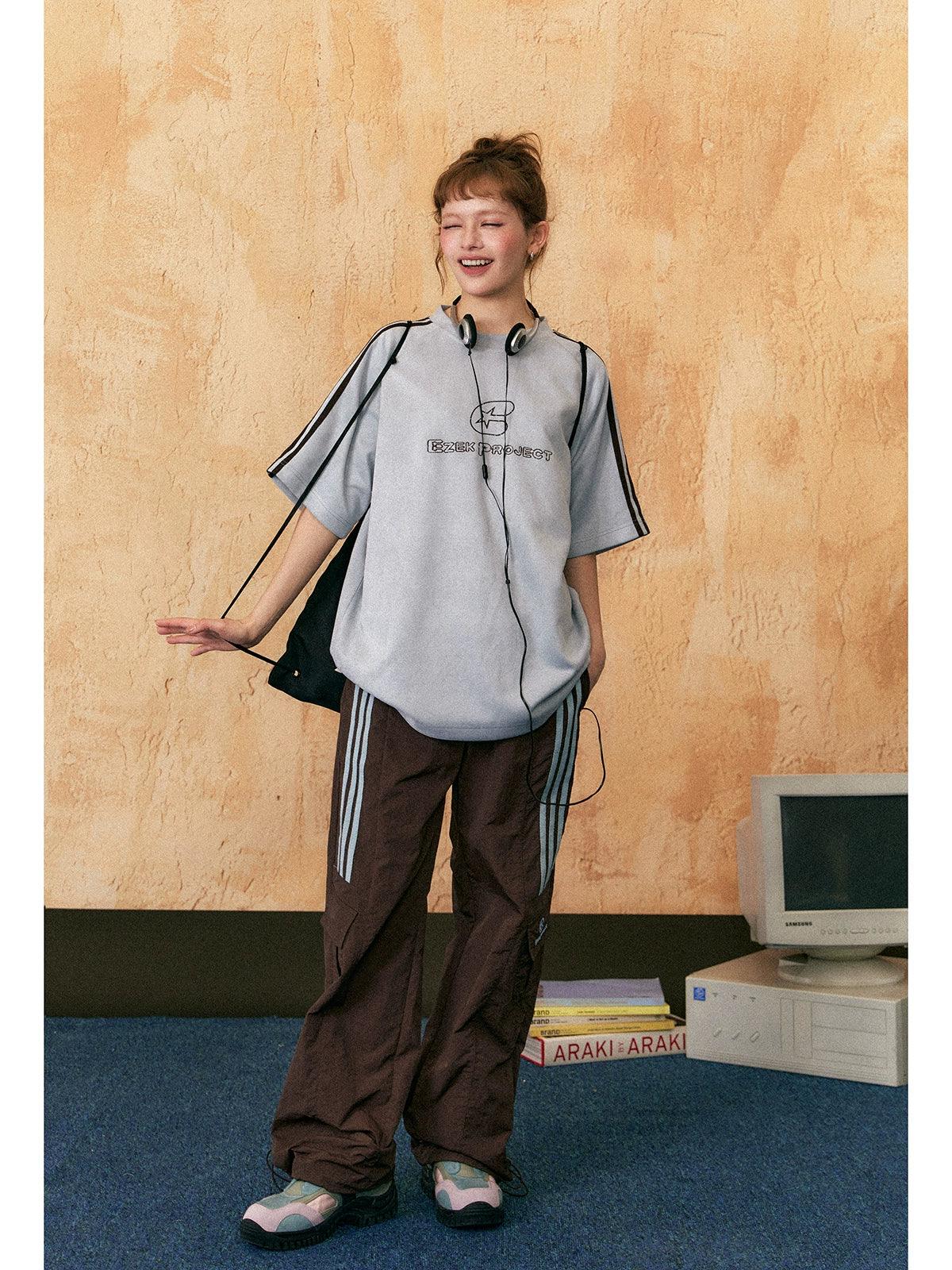 Ezek Free Project Sporty Two-piece Set - Graphic T-shirt and Wide-leg Track Pants