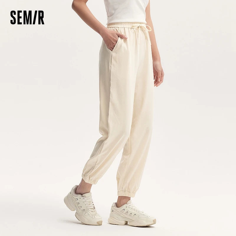 Pants for Designed With a Sense of Texture Dark Pattern Jacquard Tapered Pants With a Unique and Loose Fit